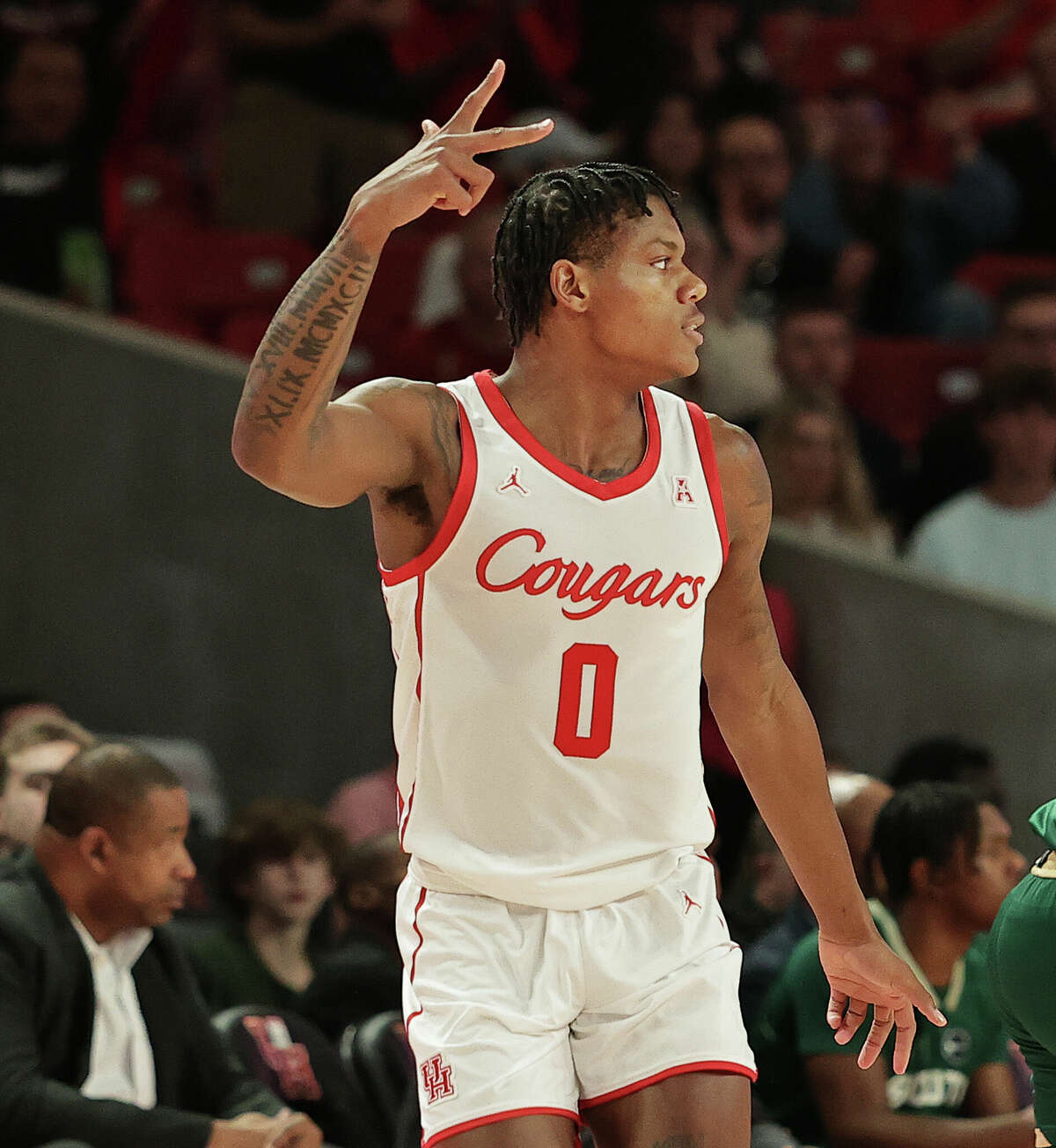Marcus Sasser #0 of the Houston Cougars signals after making a three point basket against the South Florida Bulls at Fertitta Center on January 11, 2023 in Houston, Texas. (Photo by Bob Levey/Getty Images)