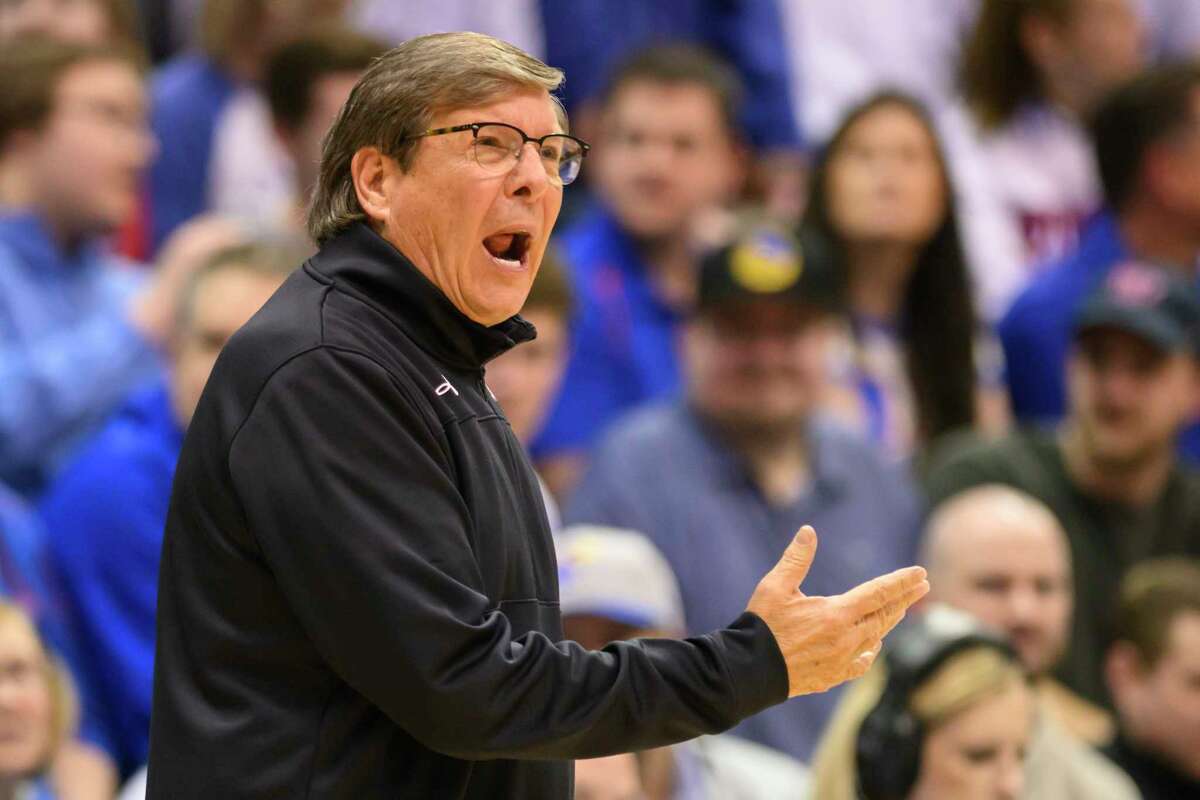 Texas Tech head coach Mark Adams calls instructions to his team against Kansas during the first half of an NCAA college basketball game in Lawrence, Kan., Tuesday, Feb. 28, 2023.