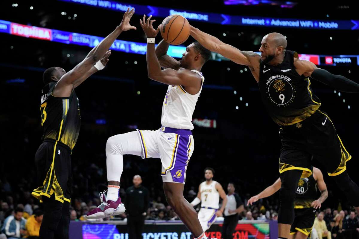Los Angeles’ Lonnie Walker IV has his shot blocked by Golden State’s Andre Iguodala, who played his third game of the season and was +11 in 14 minutes.