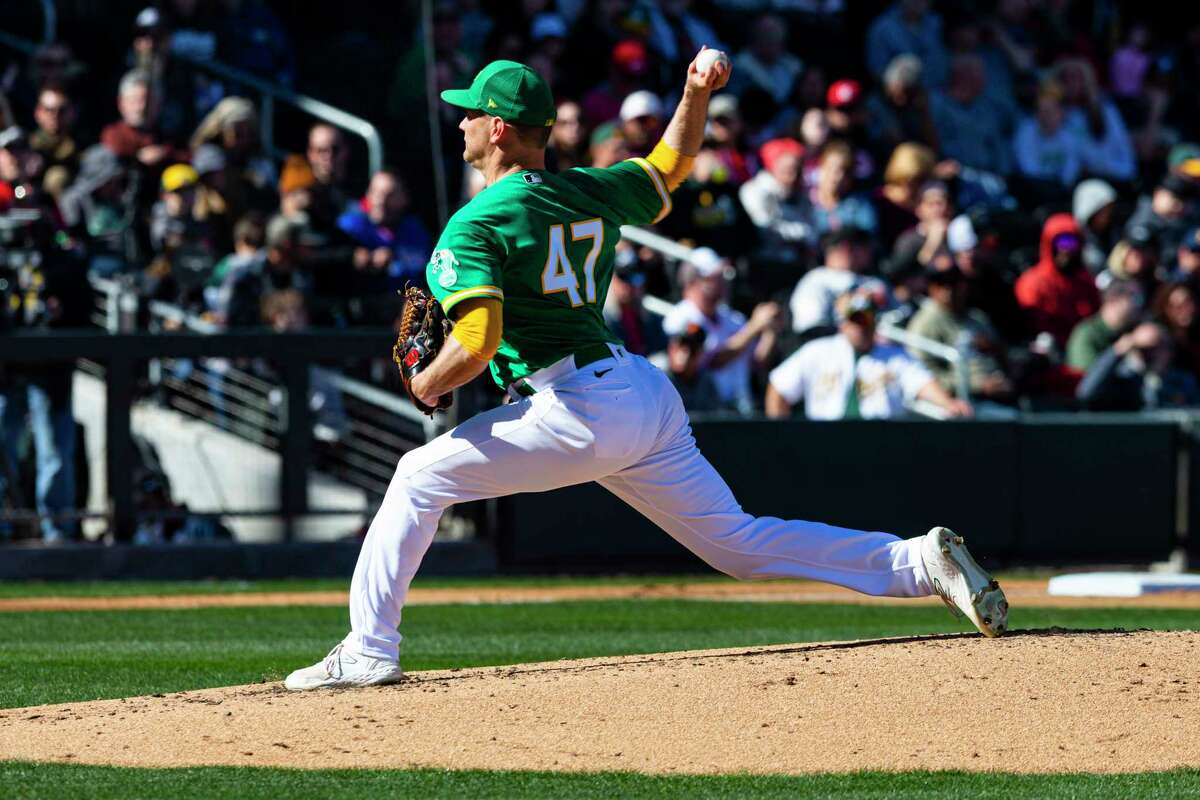Drew Rucinski, shown pitching Saturday during a spring training game against the Reds in Las Vegas, is slated for an initial rotation role to begin the season in Oakland.