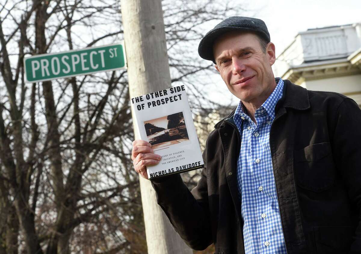Author Nicholas Dawidoff photographed on Prospect Street in New Haven, wrote the book The Other Side of Prospect: A Story of Violence, Injustice and the American City.