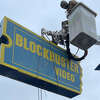 The Blockbuster sign being removed in Stamford on Saturday, March 4, 2023.