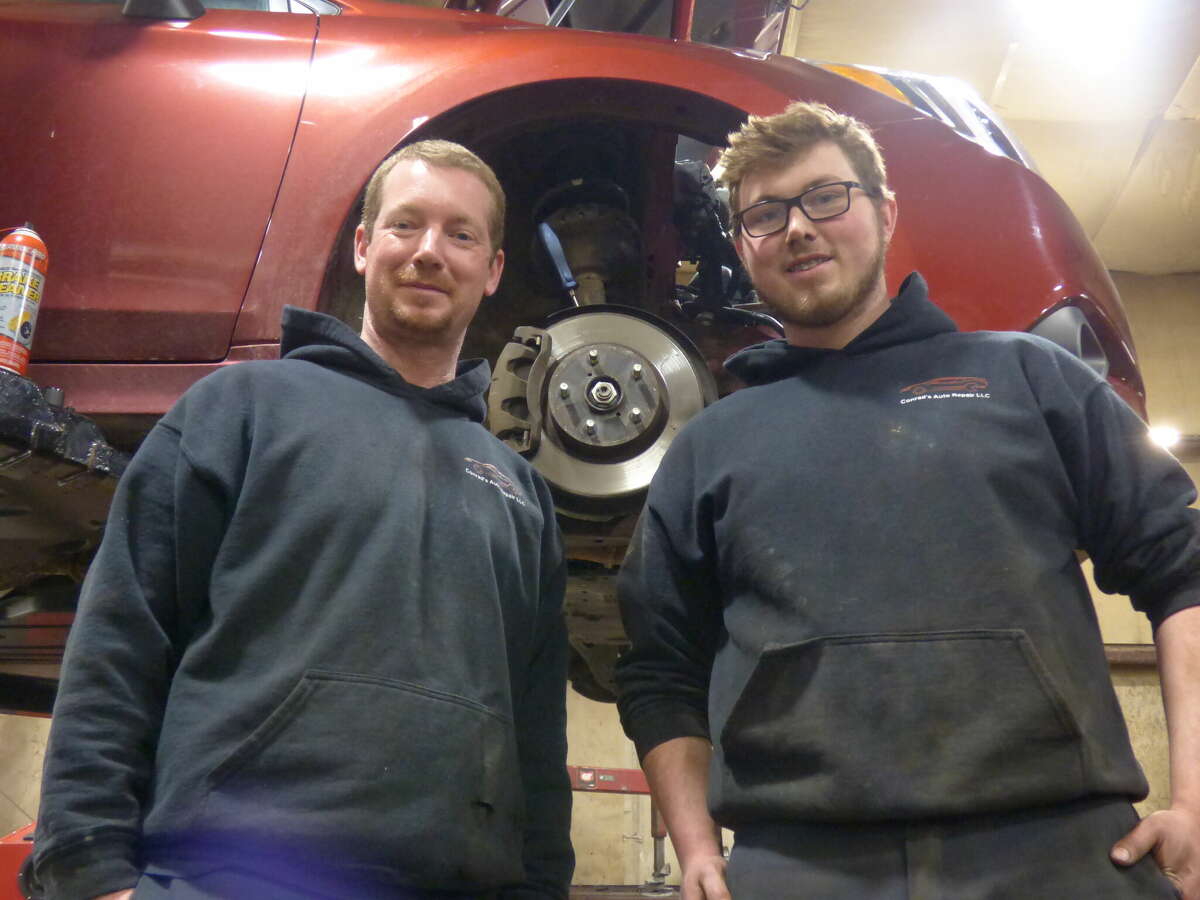 The two-man team of Duane Conrad and son Nick Conrad handle repairs at Conrad's Auto Repair in Manistee.