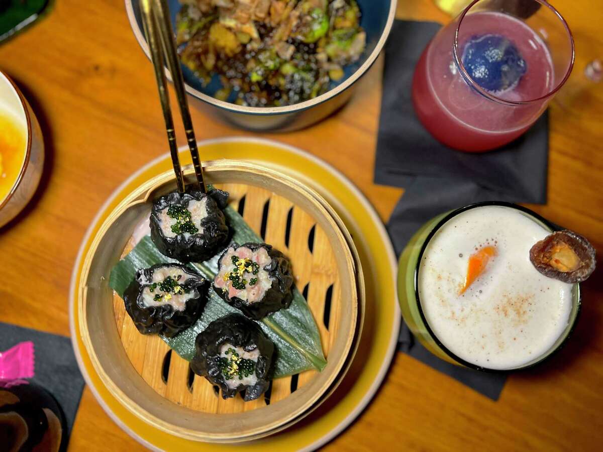 Squid ink siu mai and cocktails at Meo Bar