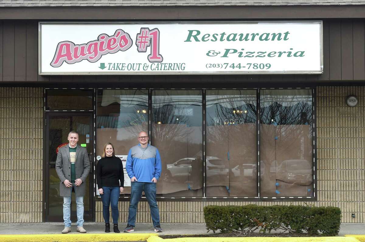Ben Vrenezi, left, and Kelly and Jason LaReau, and have partnered to open a new restaurant on Germantown Road in the former Augie’s Numero Restaurant space. Monday, March 6, 2023, Danbury, Conn.