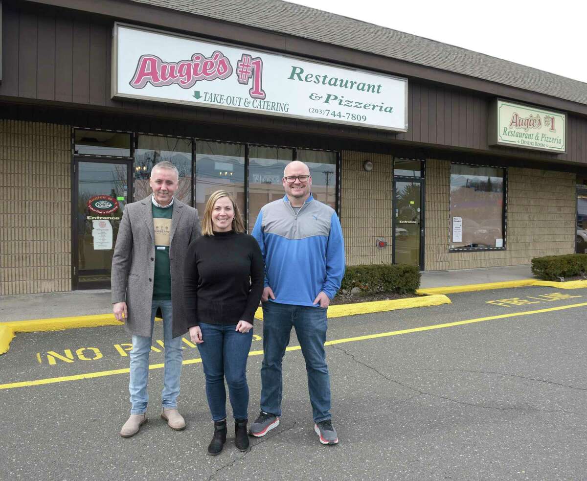 Ben Vrenezi, left, and Kelly and Jason LaReau, and have partnered to open a new restaurant on Germantown Road in the former Augie’s Numero Restaurant space. Monday, March 6, 2023, Danbury, Conn.