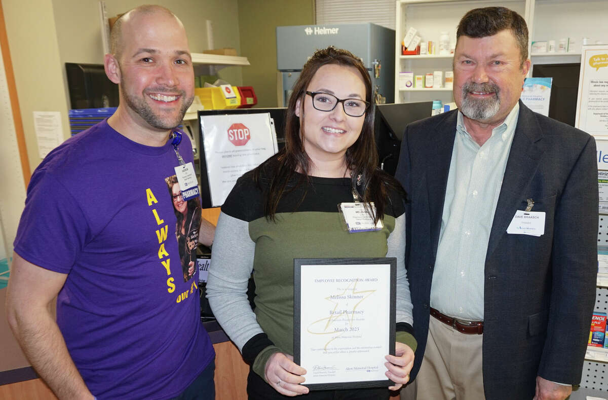Melissa Skinner, center, of the Family Care Pharmacy, is Alton Memorial Hospital's March Employee of the Month. She received the honor March 6 from pharmacy manager Andrew Kramer, left, and AMH President Dave Braasch. She has worked at Family Care Pharmacy for 15 years.