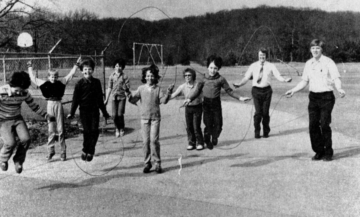 Students at North Elementary School will be participating in a Jump Rope for Heart from 9 a.m. to noon on March 19 after soliciting pledges beginning today to benefit Michigan Heart Association. (From left) Students Tim Hinds, Matt Kelly, Jason Janowiak, Teresa Thompson, Tammi Gossard, Forrest Green and Stacee Dallas are shown. Teachers Jim Sibley and Mert Youngberg are coordinating the event. The photo was published in the News Advocate on March 8, 1983.