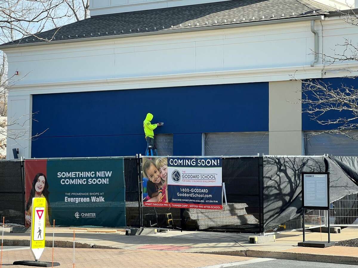 A construction worker at the new Goddard School location under construction at The Promenade Shops at Evergreen Walk in South Windsor.