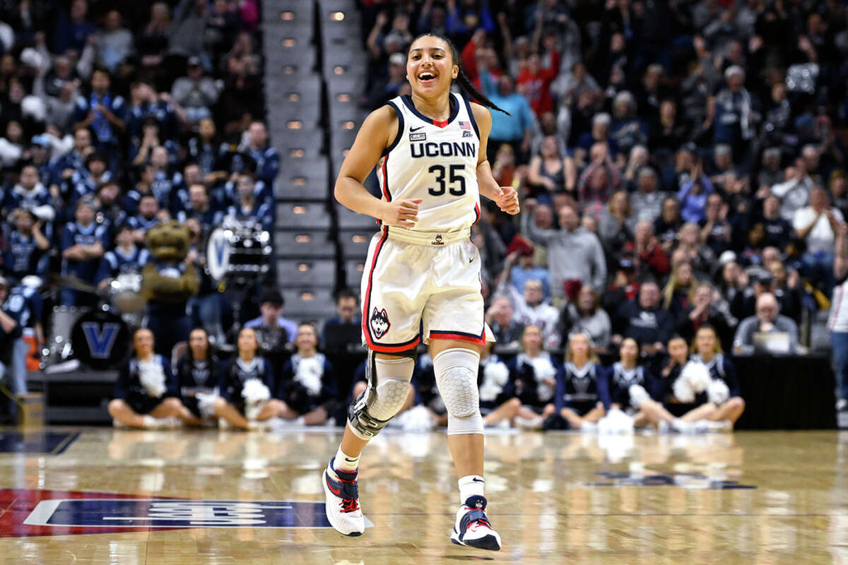 UConn's Azzi Fudd (35) smiles after making a 3 point basket during the second half of an NCAA college basketball game against Villanova in the finals of the Big East Conference tournament Monday, March 6, 2023, in Uncasville, Conn. (AP Photo/Jessica Hill)