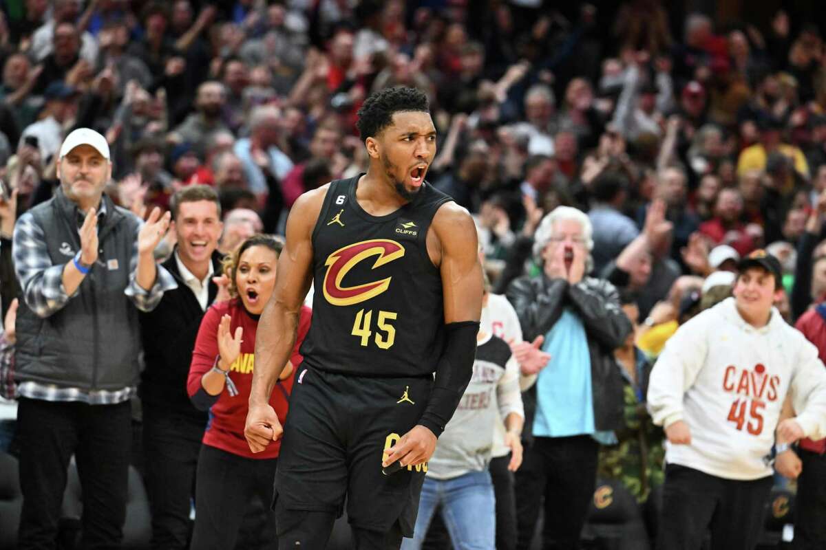 Donovan Mitchell scored 40 points and added 11 rebounds to lead the Cleveland Cavaliers past the Celtics in overtime.