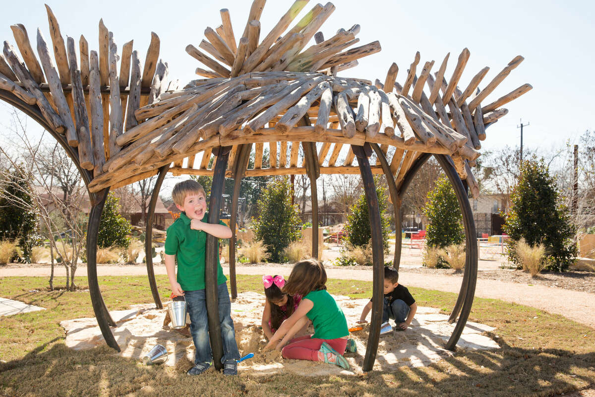 Kids play in the Family Adventure Garden.