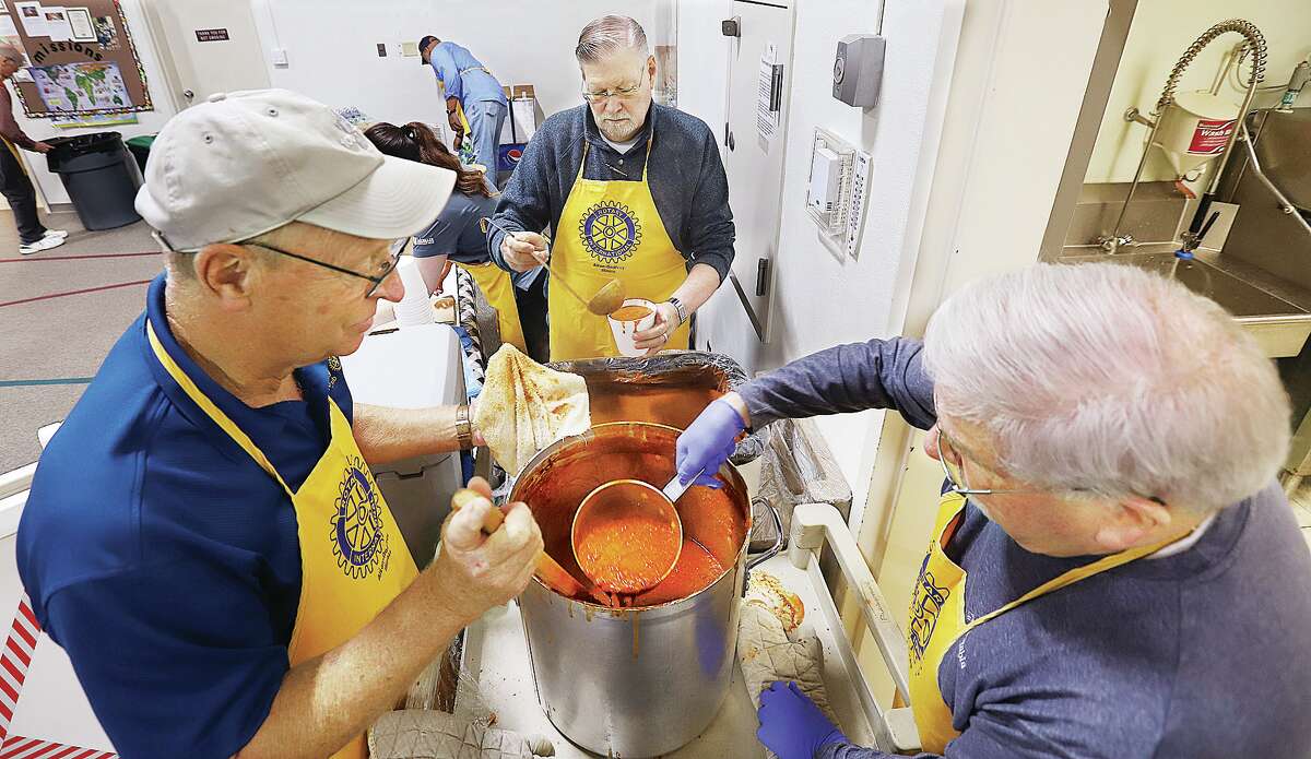 Members of the Alton-Godfrey Rotary Club were dishing it up hot Monday during the 37th Annual Chili Chowdown held at the Main Street United Methodist Church in Alton. Proceeds from the popular fund-raiser help support the Rotary's many community projects. At lunchtime there was a big crowd seeking the all-you-can-eat chili, beverage and dessert for $10. Many carry out orders were also prepared.
