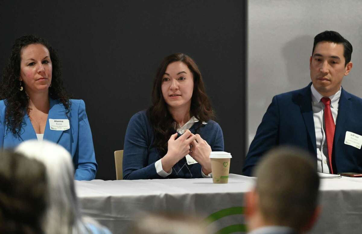 Alanna Russo, head of strategic engagement for Community Offshore Wind, left, Amana Schoen, director of industry relations for Equinor, center, Jeff Lee Romero, director of local content offshore development with Leading Light Wind, right, participate in an wind turbine panel discussion during a conference on opportunities in offshore wind development on Tuesday, March 7, 2023, at the University at Albany’s ETEC Building in Albany, N.Y.