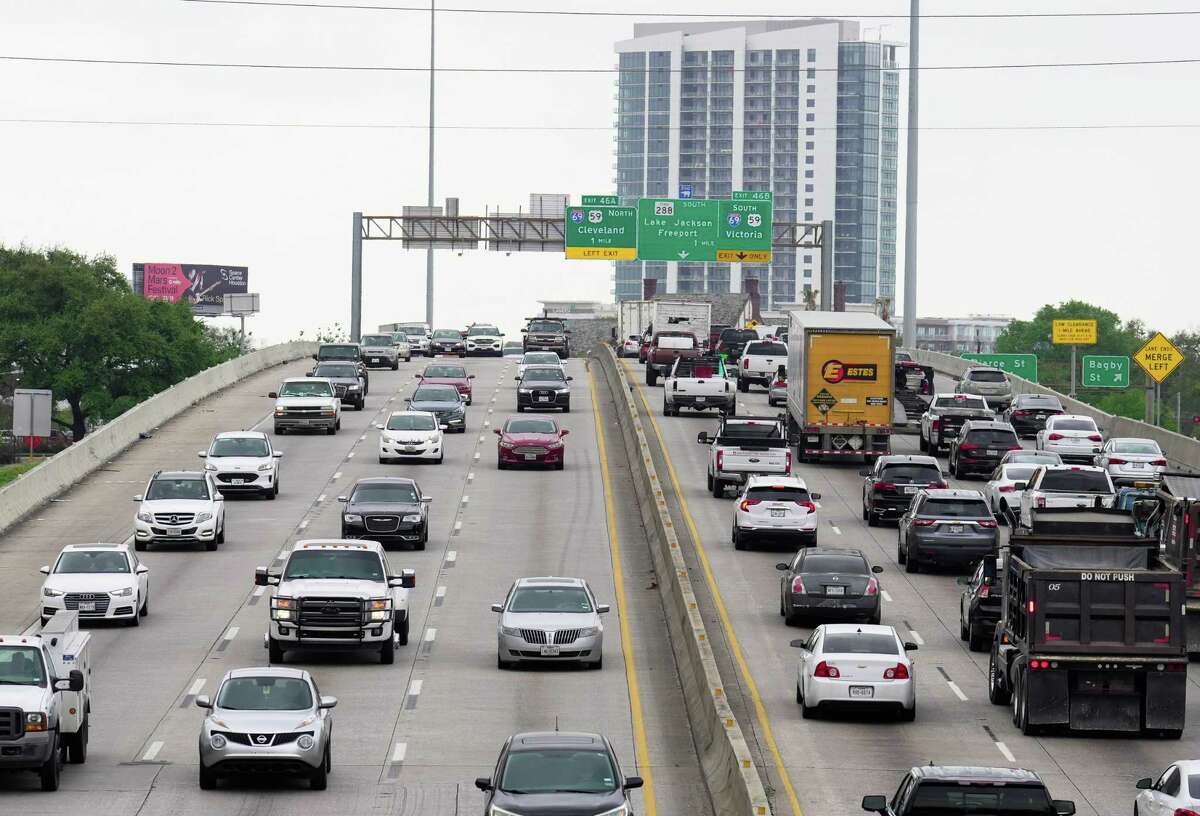 Traffic moves along Interstate 45 north of the West Dallas bridge in downtown Houston on Tuesday, March 7, 2023. Texas Department of Transportation and federal highway officials have agreed to conditions to lift a pause on rebuilding I-45 in Houston, provided TxDOT meets various conditions to protect neighborhoods surrounding the freeway.
