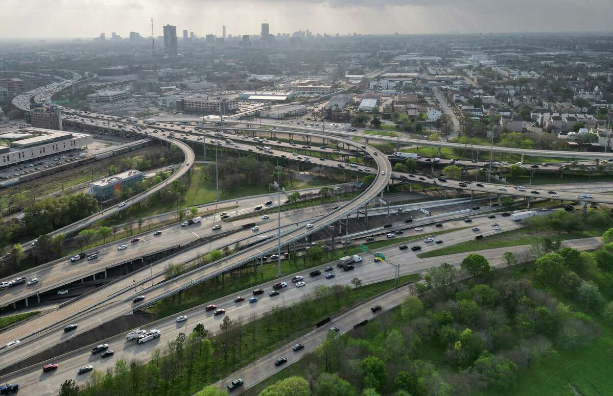 Traffic merges from Interstate 10 to Interstate 45 near White Oak Bayou Greenway on Monday, March 6, 2023, in Houston.