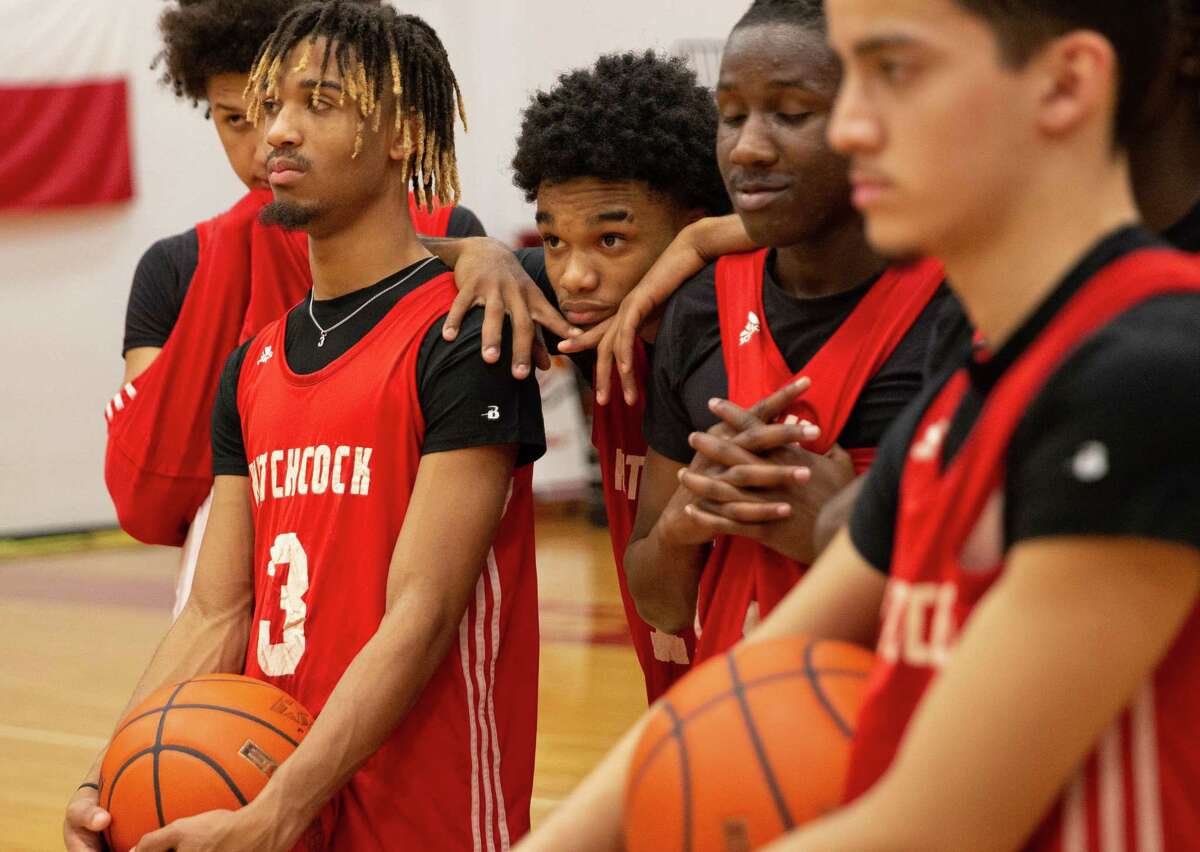 Hitchcock players listen to coach Chris Jordan-Foster on Tuesday as he updates them on their playoff schedule.