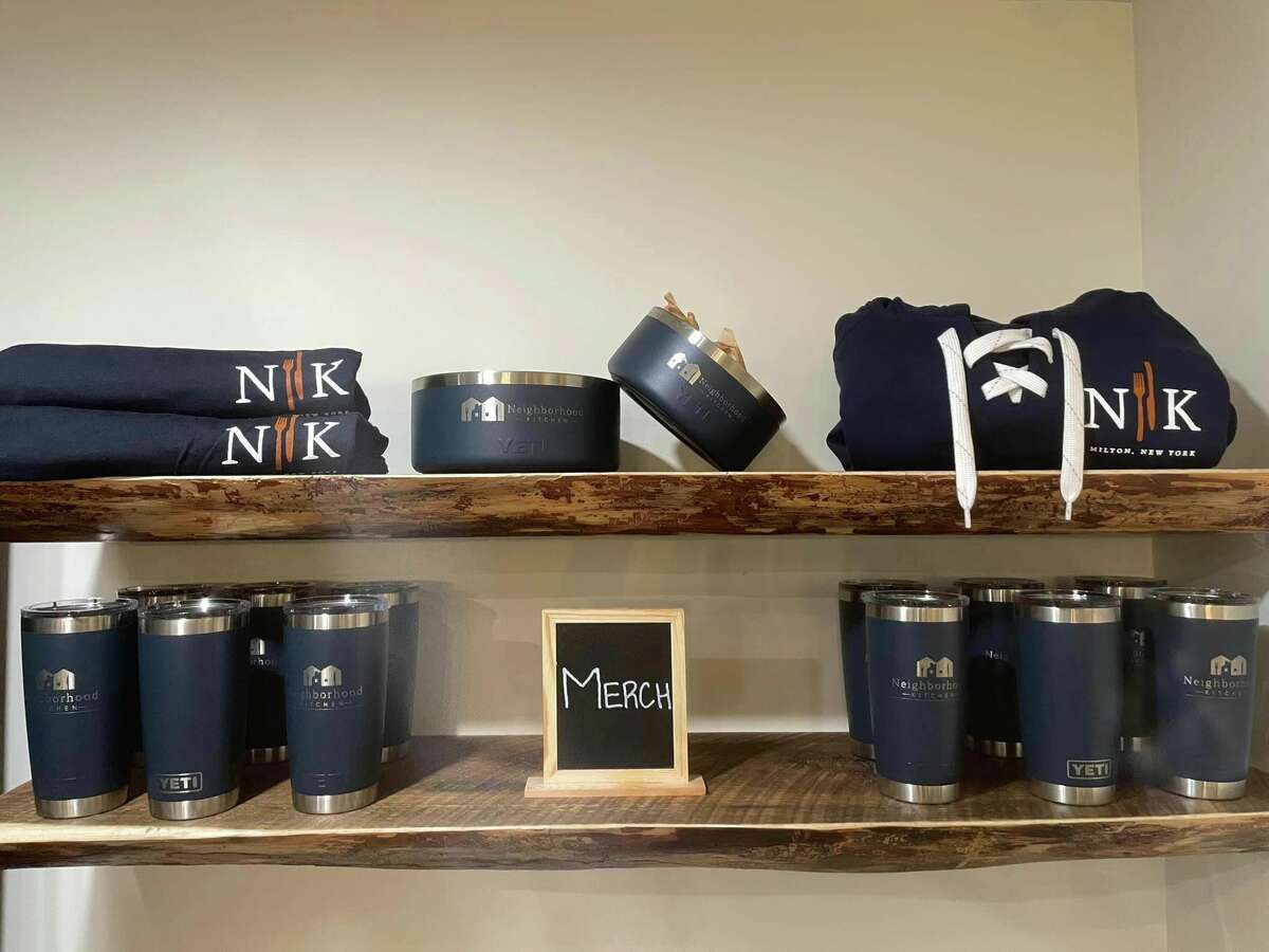 The market section of Neighborhood Kitchen will offer grab-and-go items as well as an expanding selection of locally grown and made items from area farms and purveyors. Already on shelves is NK-branded merchandise.
