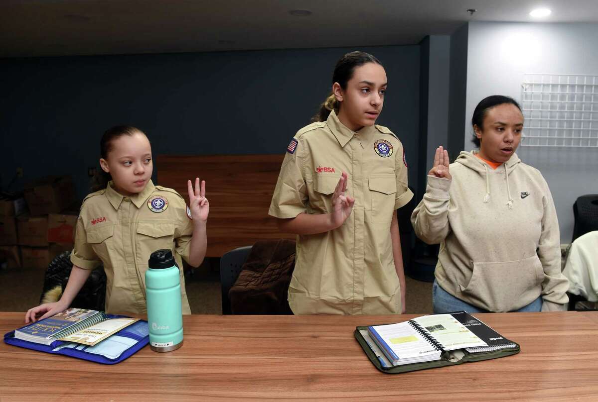 girl scouts taking oath