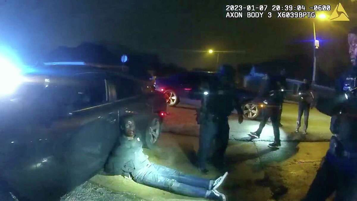 FILE - In this image from video released on Jan. 27, 2023, by the city of Memphis, Tenn., Tyre Nichols leans against a car after a brutal attack by five Memphis Police officers on Jan. 7, in Memphis. The Justice Department announced Wednesday, March 8, that it will review the Memphis Police Department policies on use of force, de-escalation policies and specialized units in response to the fatal beating of Tyre Nichols during an arrest. 