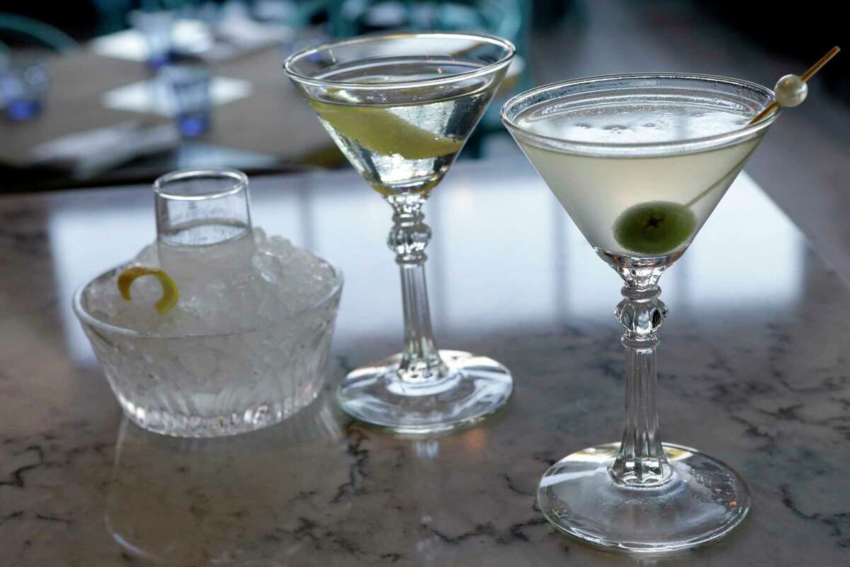 A Star Fish mini martini with a sidecar, left, and an H-Town Tini, right, are displayed at Star Fish, 191 Heights Blvd., Thursday, Nov. 9, 2017, in Houston.