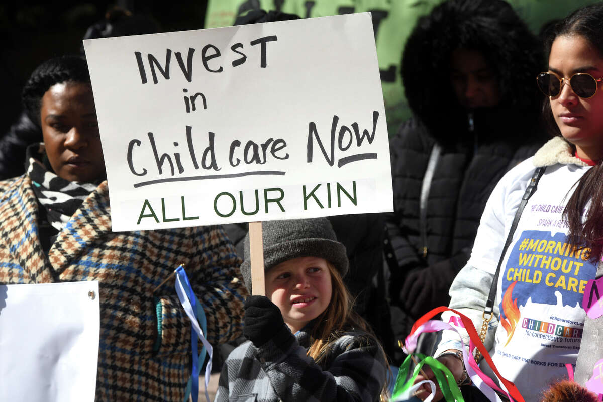 Child-care providers, parents and children gather for a “Morning Without Child Care” rally at the McLevy Green, in Bridgeport, Conn. March 8, 2023.