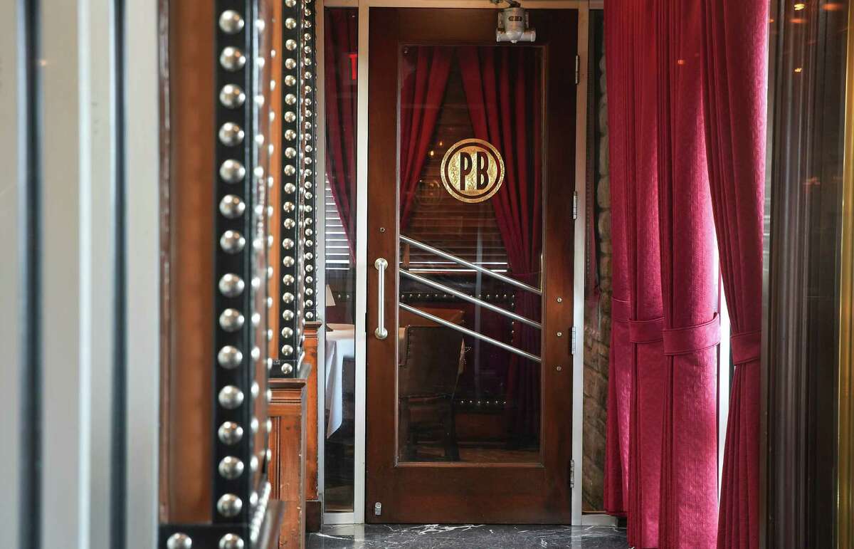 A monogramed interior door at Pappas Bros.Steakhouse on Westheimer Road on Wednesday, March 8, 2023 in Houston.