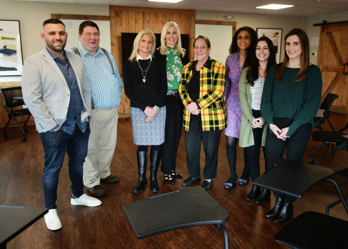 From left; Will Testani, Randall DeGeorge, Nancy Tauck, Debbie Cambareri, Janet Isdaner, Lakshmi Nair, Gina Senerchia, and Julianne Vesciglio in one of two group therapy rooms at the Turnbridge mental health and addiction treatment center in Westport, Conn. on Wednesday, March 08, 2023.
