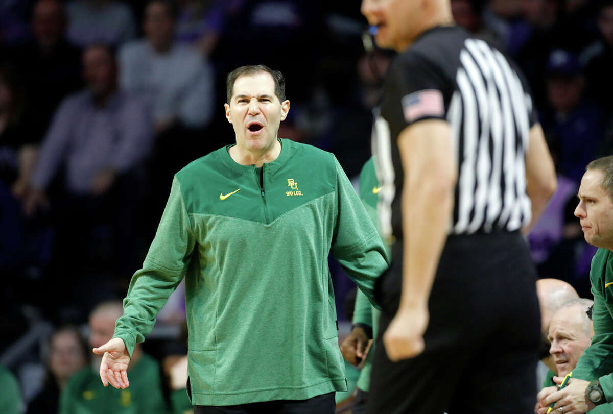 Baylor head coach Scott Drew reacts to a foul called on his team during the second half of an NCAA college basketball game, Tuesday, Feb. 21, 2023, in Manhattan, Kan. (AP Photo/Colin E. Braley)