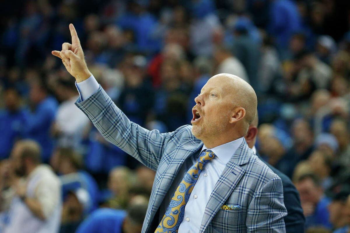 UCLA head coach Mick Cronin directs against Arizona during the first half of an NCAA college basketball game Saturday, March 4, 2023, in Los Angeles. (AP Photo/Ringo H.W. Chiu)
