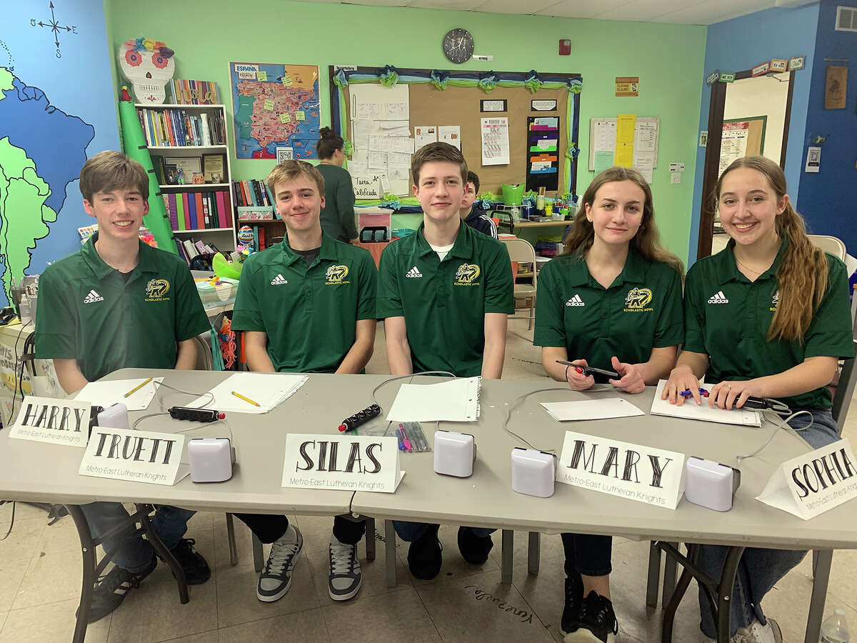 The Metro-East Lutheran High School team is shown in action at a recent scholar bowl. The team advances to sectionals Saturday at Father McGivney Catholic High School. 