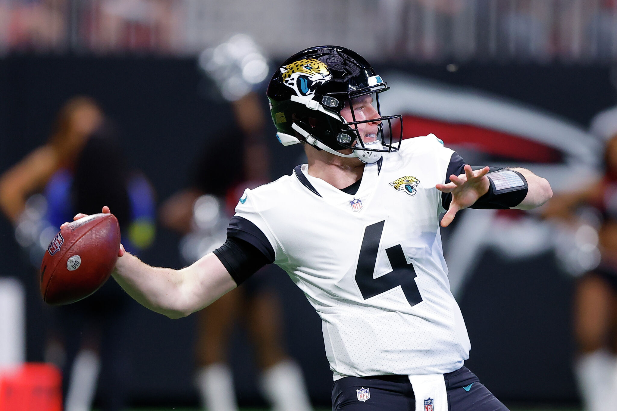 Houston Texans quarterback E.J. Perry (3) drops back to pass in the second  half of an NFL preseason football game against the New Orleans Saints in  New Orleans, Sunday, Aug. 27, 2023. (