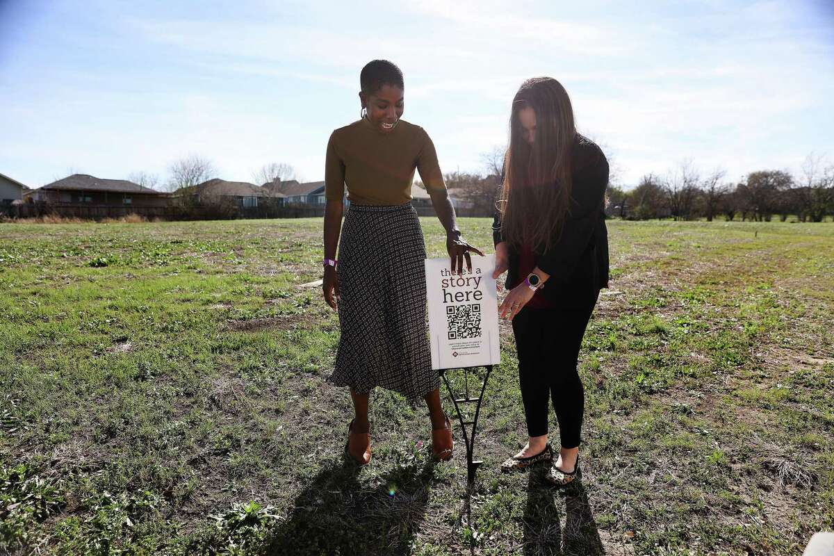 Pamela Walker, history professor at Texas A&M - San Antonio (from left) and former student Vanessa Godsey stake a marker at a site that was once home to the Ritz Motel along East Commerce Street on Wednesday, Feb. 22, 2023. The San Antonio African American Community Archive & Museum hosted a tour for the unveiling of Green Book Historical Markers around San Antonio that were designated safe spaces for Black motorists during the Jim Crow era. A group of about 50 people went on the tour on the city’s Eastside with historians and educators who learned of locations around San Antonio marked as safe spaces for African Americans.