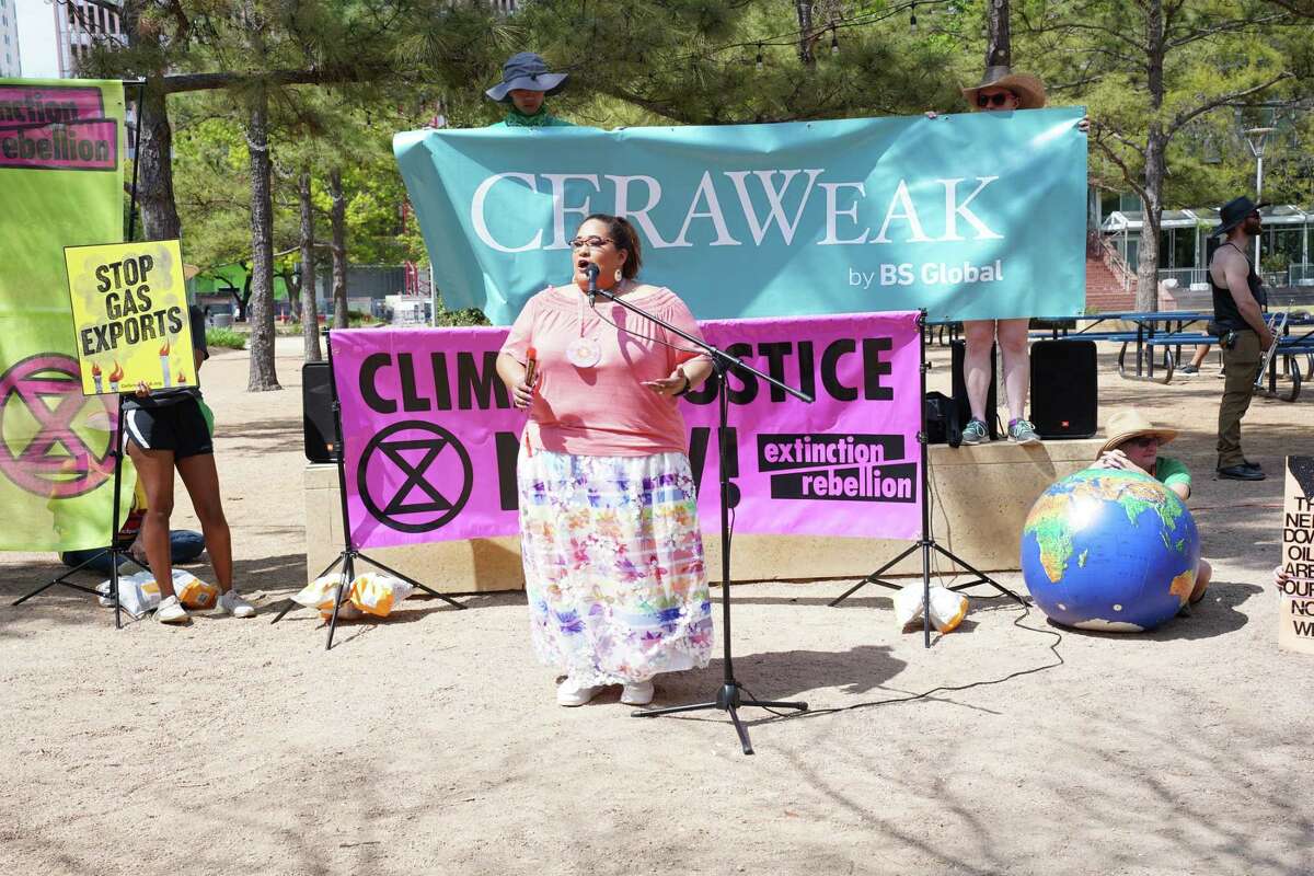 Christa Mancias speaks at the “Climate Criminals” protest was hosted by the Permian Gulf Coast Coalition and ‘Save Texas’ campaign, across the street from the George R. Brown Convention Center in Houston, Texas, where the CERAweek energy conference is taking place, on March 8, 2023. The “Climate Criminals” parade and protest was hosted by the Permian Gulf Coast Coalition and ‘Save Texas’ campaign to bring attention to the negative impacts of fossil fuel pollution on Texas and Louisiana communities.