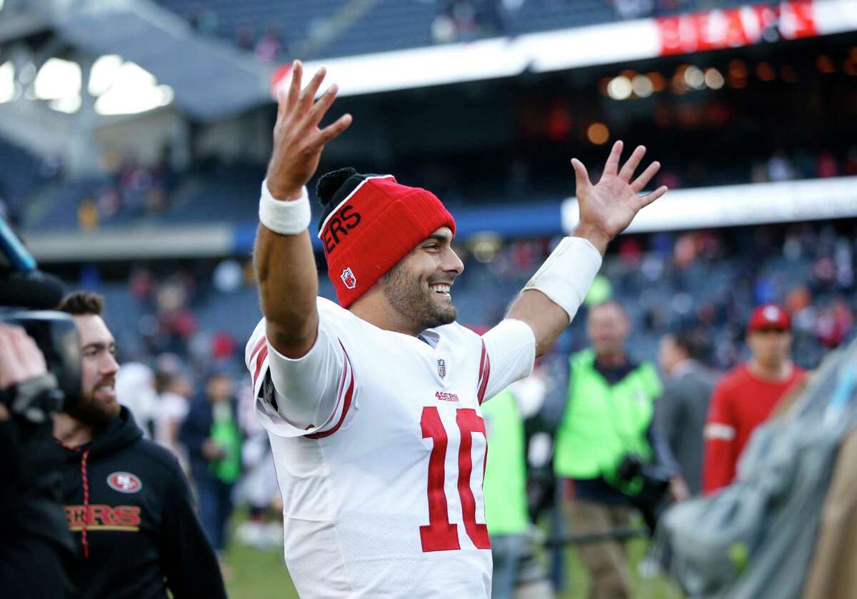 Quarterback Jimmy Garoppolo celebrates after his first start, when the 49ers defeated the Chicago Bears 15-14 at Soldier Field on Dec. 3, 2017.