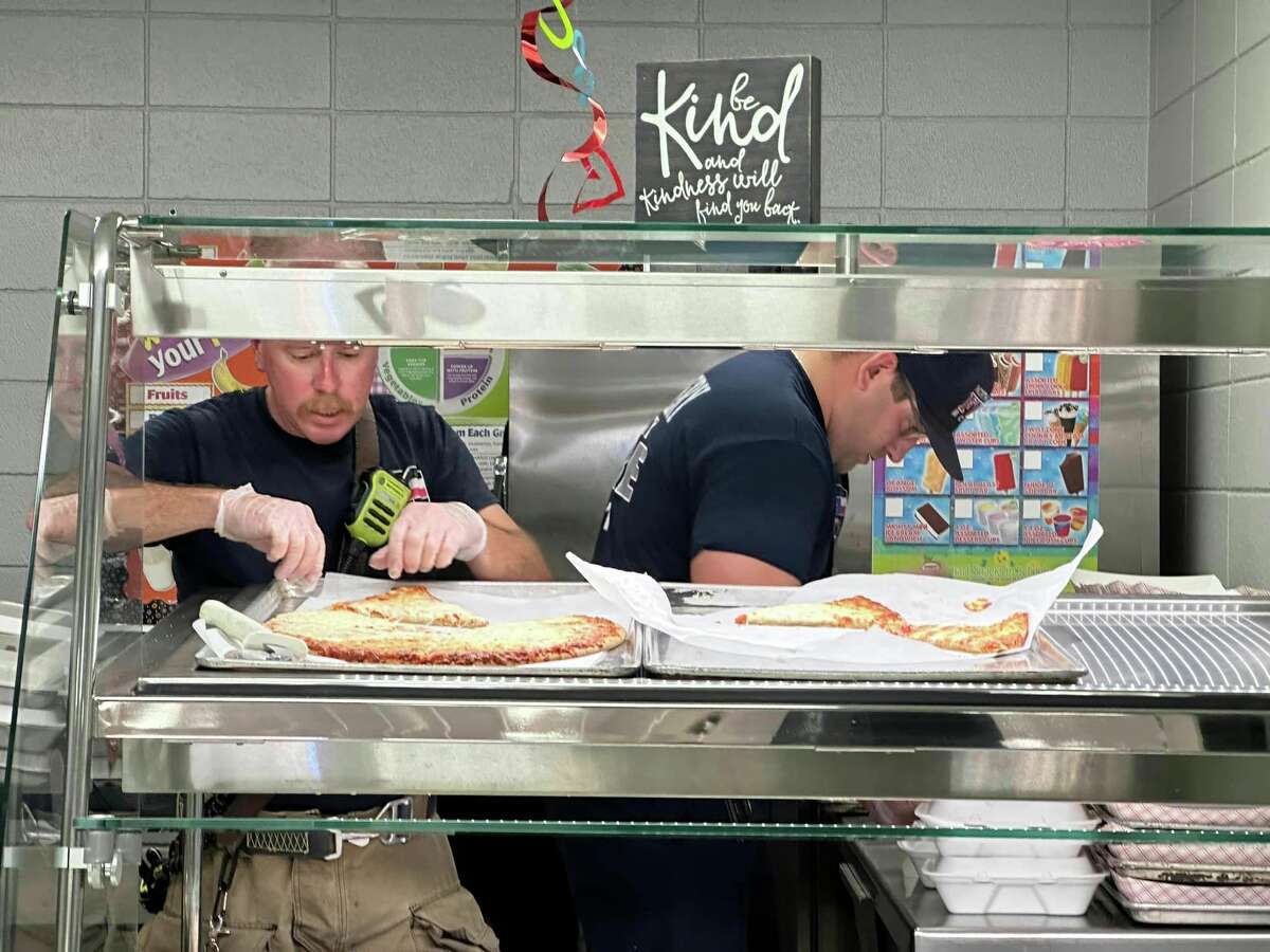 North Montgomery County firefighters prepare 1,000 meals for students at Lynn Lucas Middle School on February, 14, 2023. Firefighters responded to a fire at a large concession stand at the school, where they evacuated students and staff to the Willis Community Center and C.C. Hardy Elementary School.
