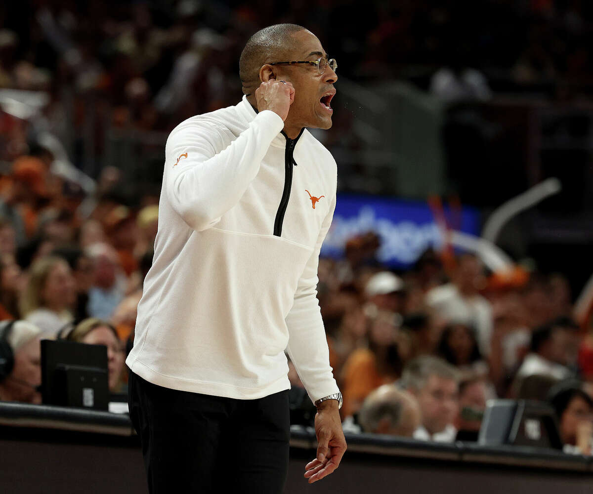 Acting head coach Rodney Terry of the Texas Longhorns yells instructions to his players during the game against the Kansas Jayhawks in the second half at Moody Center on March 04, 2023 in Austin, Texas.