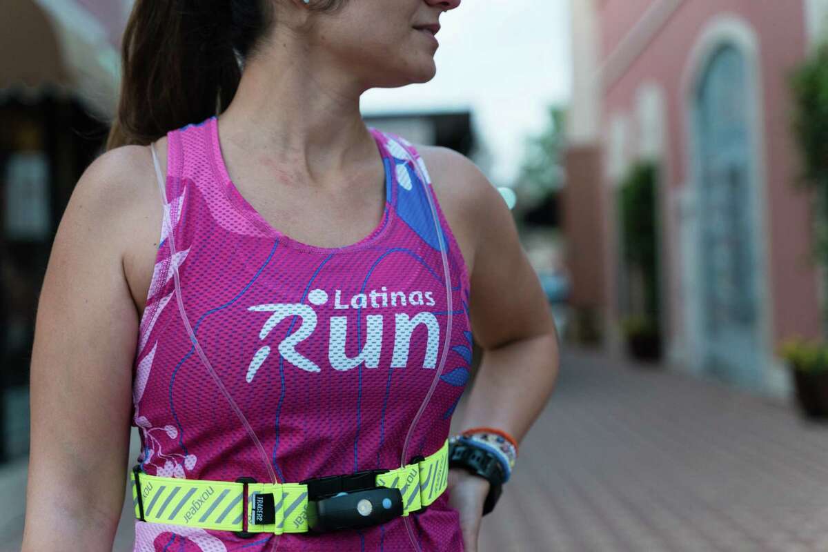 Rosa Perez wears a Latinas Run jersey in Willowbrook on Wednesday, March 8, 2023.
