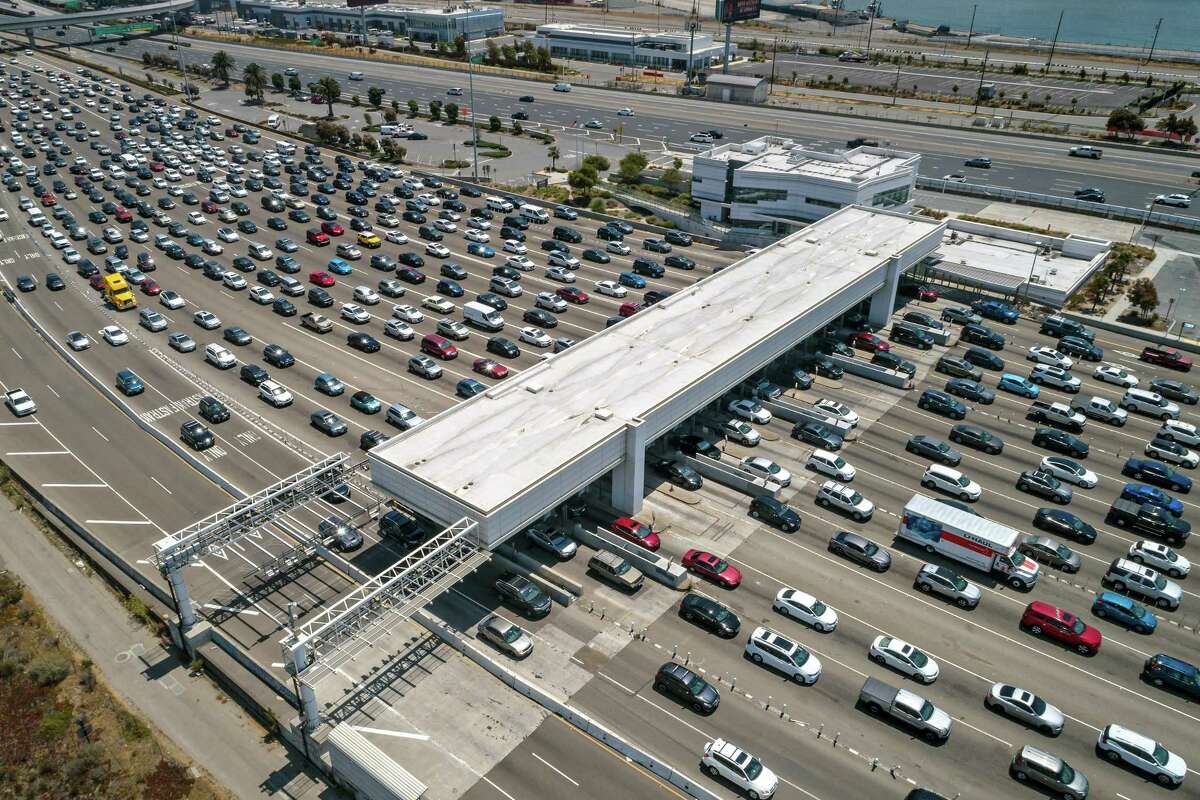 Bay Area planners are considering plans to toll highways to reduce regional traffic congestion, such as this 2021 scene at the Bay Bridge.