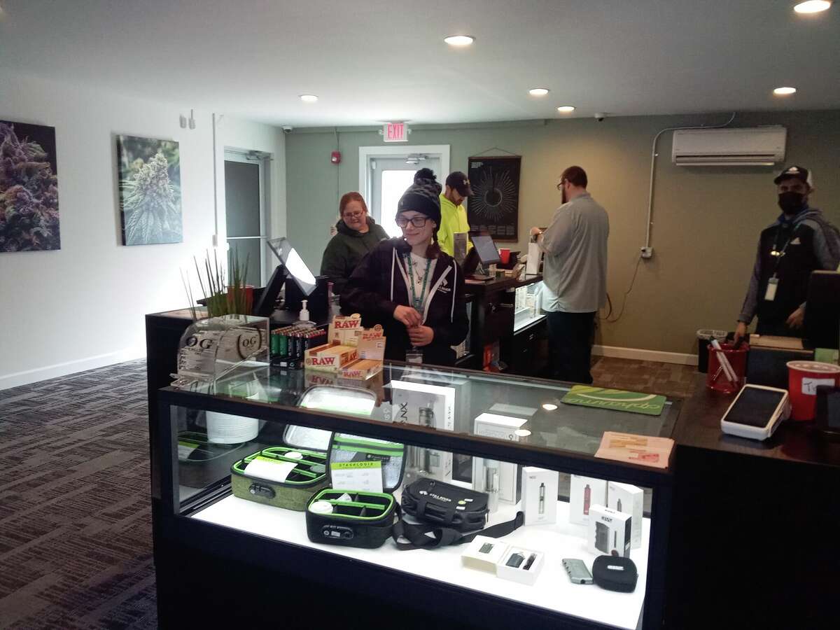 Natalie Arel works the counter at Still River Wellness' retail cannabis store, which opened March 1 on Winsted Road in Torrington. 