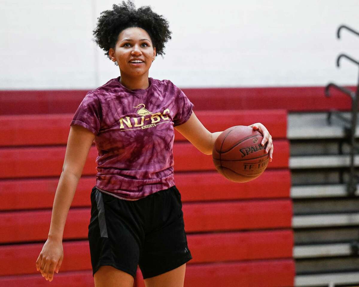 Bishop Gibbons junior captain Mia’Rose Wylie, shown preparing for the state Class D quarterfinals at practice Thursday, scored 11 points in the Golden Knights' win over Seton Catholic on Saturday, March 11, 2023.