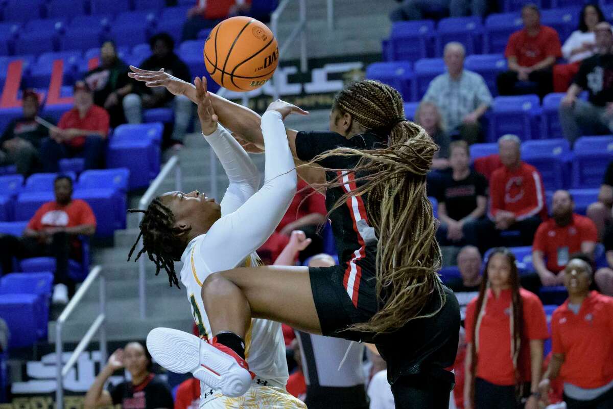 Southeastern Louisiana guard Dijone' Flowers, left, is fouled by Lamar forward NJ Weems, right, during the first half an NCAA college basketball game in the finals of the Southland Conference women's tournament in Lake Charles, La., Thursday, March 9, 2023. (AP Photo/Matthew Hinton)