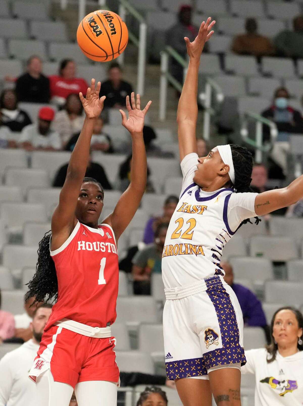 Houston forward Bria Patterson (1) takes a shot over East Carolina guard Danae McNeal (22) during the first half of the American Athletic Conference women's basketball tournament championship game on Thursday, March 9, 2023, in Fort Worth.