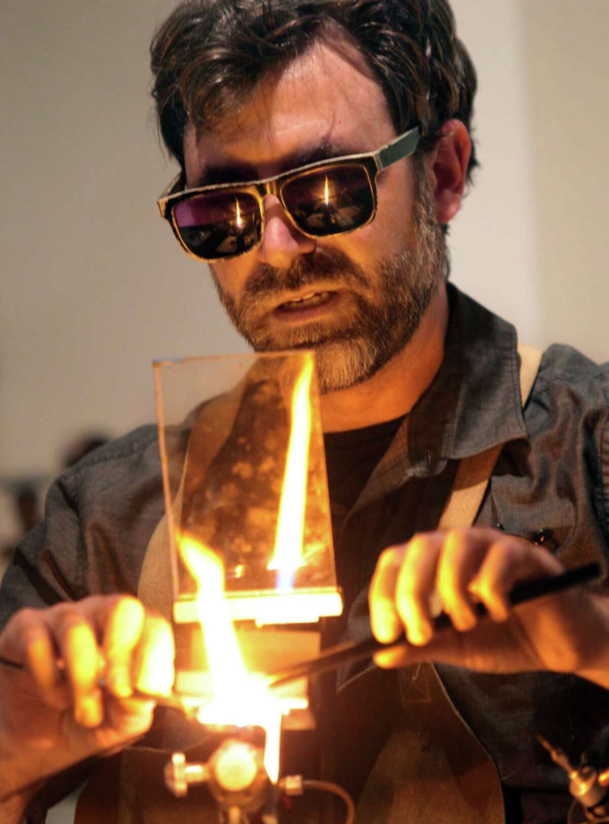 Greenwich glass artist David Licata gives a demonstration of his art at Greenwich Arts Council's Bendheim Gallery in Greenwich, Conn., on Thursday March 9, 2023.