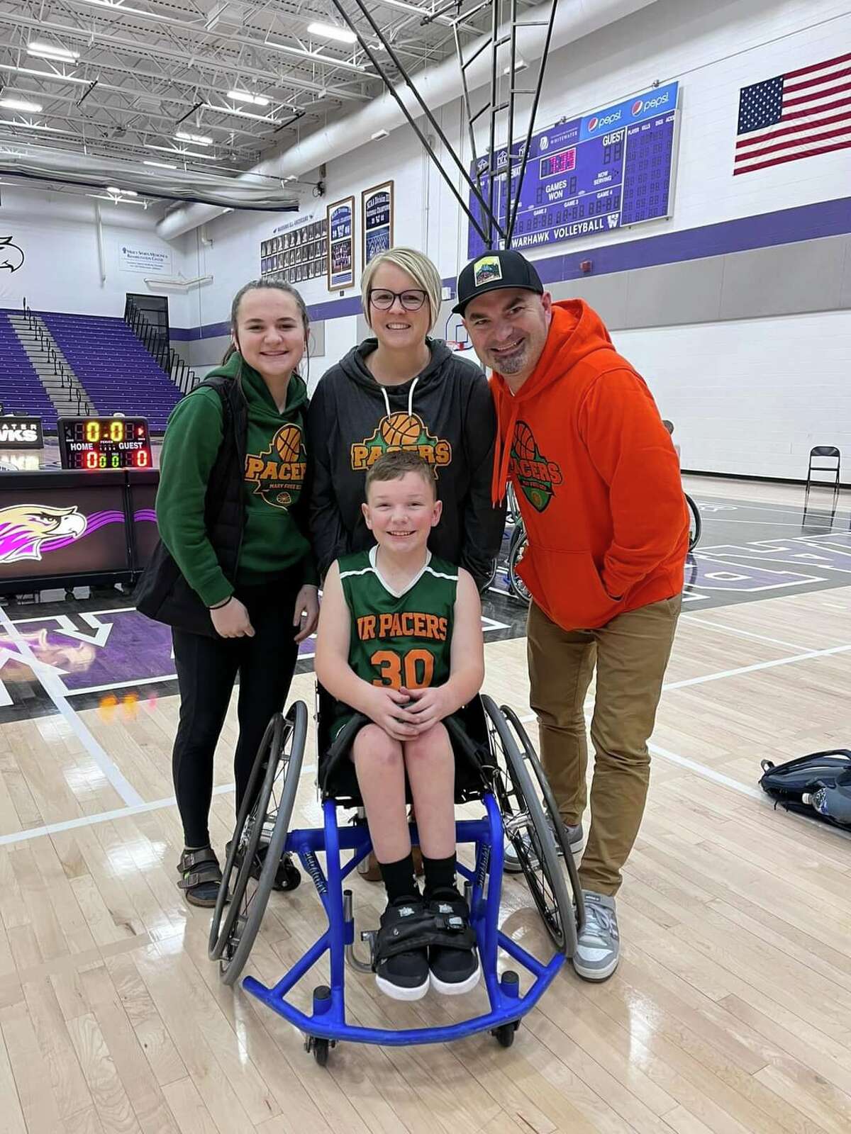 Pictured with Chase Fuller, 11, of  Big Rapids are three members of his family with, from left, Kennadi Fuller (sister), Sarah Fuller (mom) and Kenny Fuller (dad),