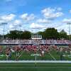 New Canaan football players and town youth players at Dunning Stadium in 2020. Money to upgrade the stadium is not in the proposed 2023-24 budget just approved by the town finance board.