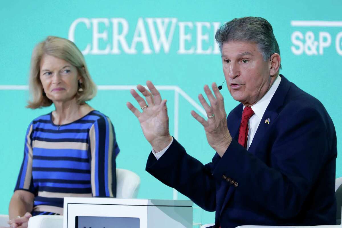 U.S. Sen. Lisa Murkowski-AK, left, listens as Sen. Joe Manchin-WV, right, speaks during a dialogue session titled ÒWhatÕs Ahead in Washington?Ó at CERAWeek 2023, held at the Hilton Americas Friday, March 10, 2023 in Houston.