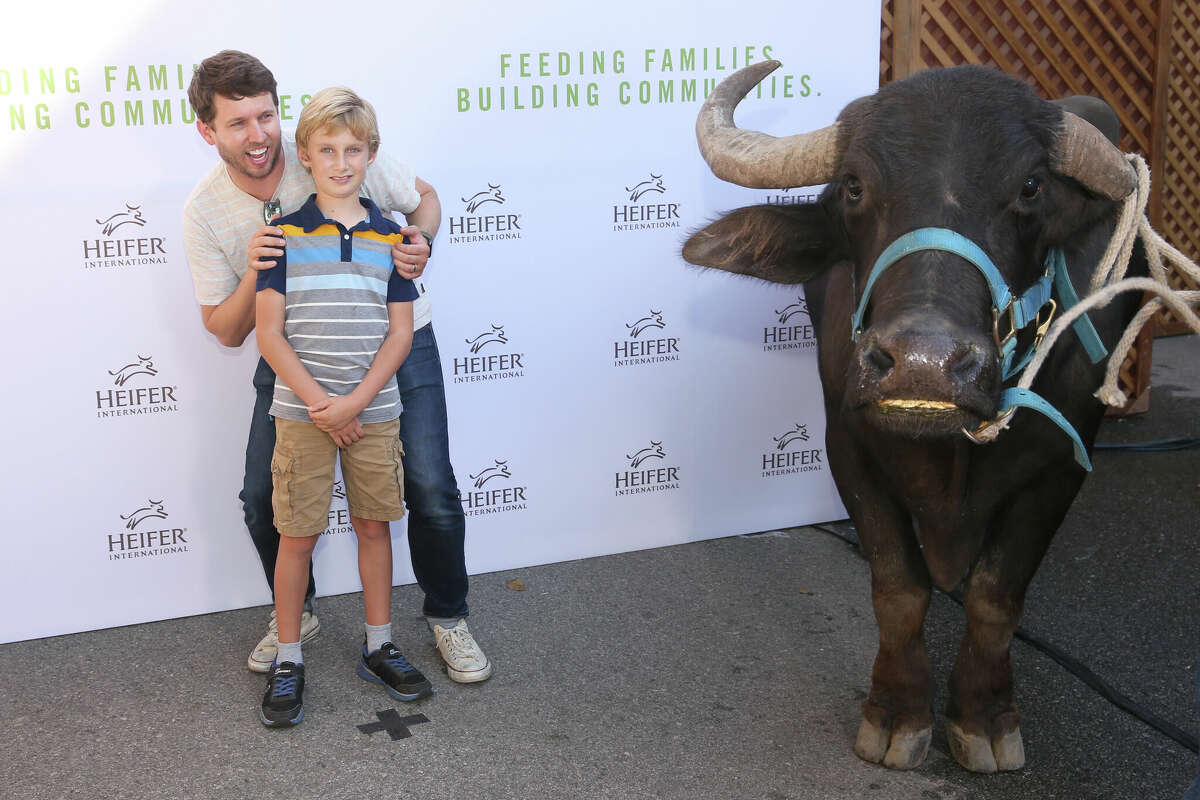 Jon Heder (left) and family attend the Feeding Families and Building Communities: Heifer International Event with NBC at Universal Studios Backlot on October 21, 2018 in Universal City, California. 