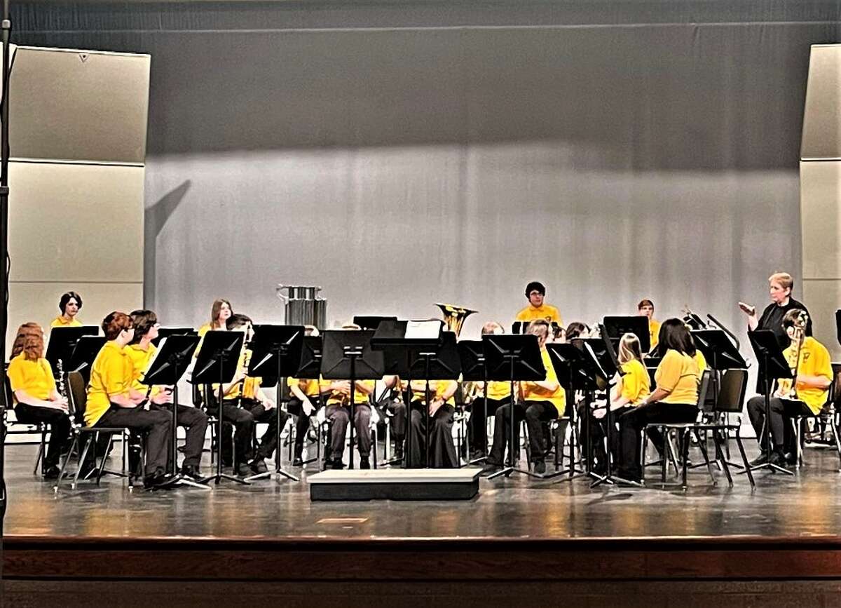Manistee's eighth grade band prepares to perform March 8 at the Michigan School Band and Orchestra Association District 1 Band Festival in the Manistee Middle High School auditorium.