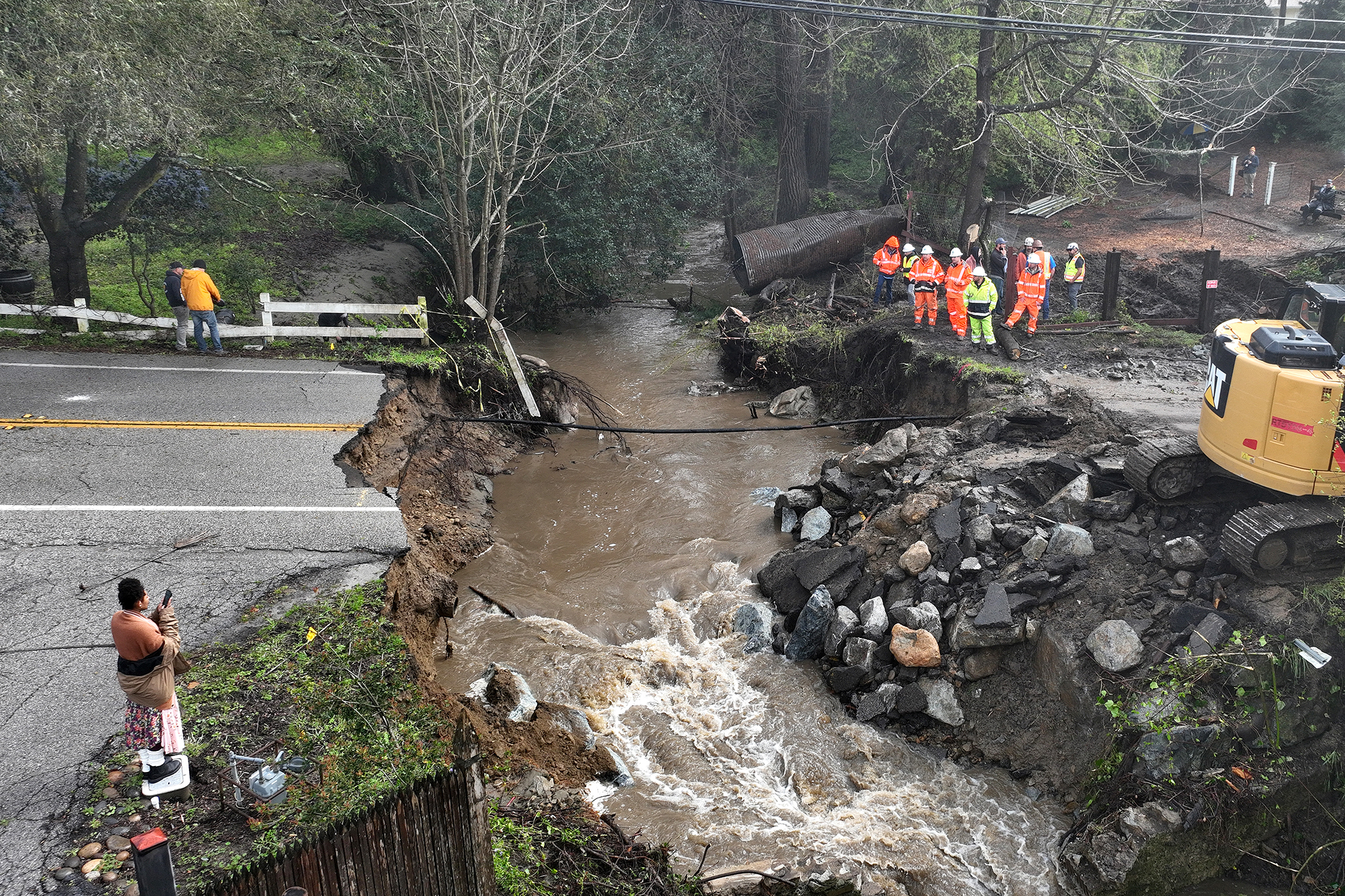 Road washes away in Santa Cruz County cuts off up to 300 people